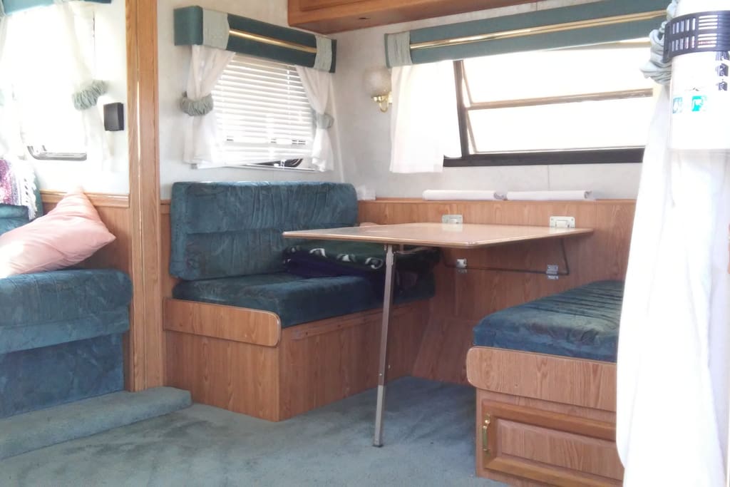 Kitchen table can be converted to a bed.