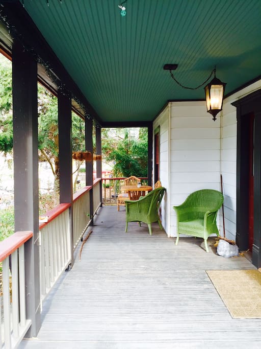 Wrap-around front porch with seating