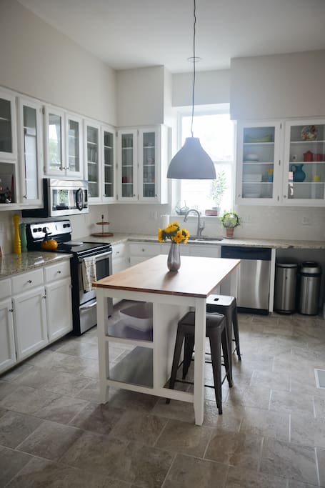 Kitchen is light and airy and guests have access in the event that you want to save money and cook for yourself.