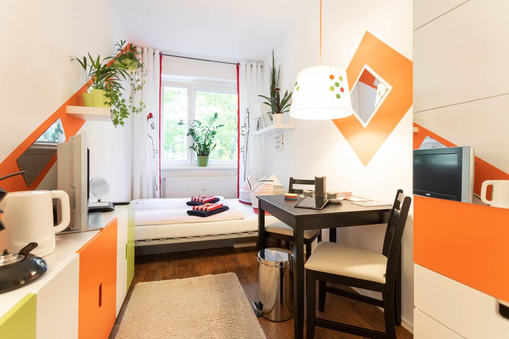 guest room with dining and working space