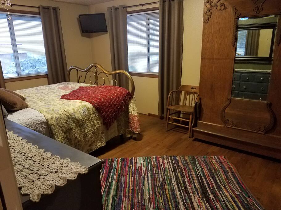 Antique Murphy bed for extra sleeping space. Bedroom TV with DVD only.