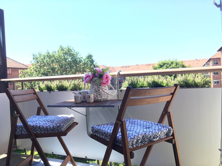 Gorgeous balcony to enjoy meals or a drink on. Privacy screen on left to shield from neighbor.
