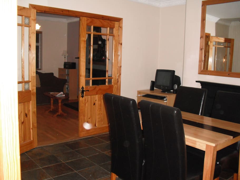 Dining area leading to Sitting room.