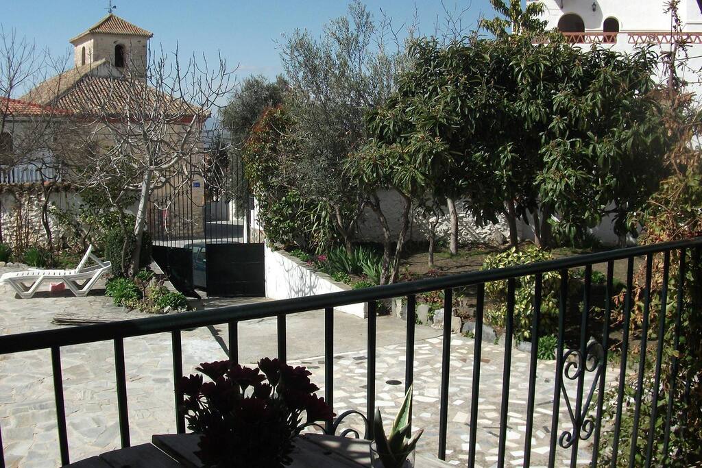 View from balcony to garden and church