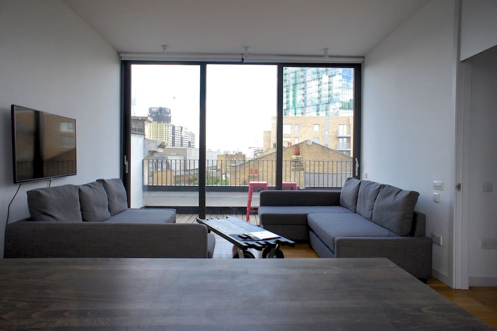 Here's your living room with two double sofa beds