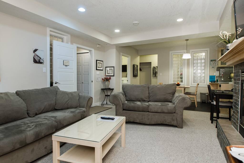 Very spacious open living room with adjoining dining room and gas fireplace