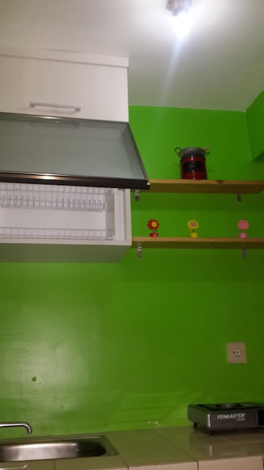 kitchen set, gas stove and kitchen utensils.