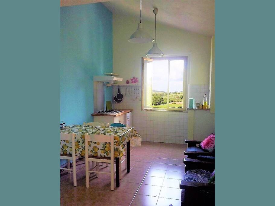 Kitchen area with beautiful views of the Tuscan countryside.