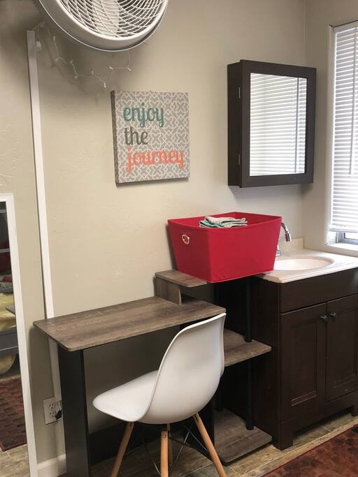 This is the room available for you to sleep in. It has a private sink with toiletries for you to us, a closet, a desk, and 2 full sized beds. There is also a fan for extra circulation or white noise.