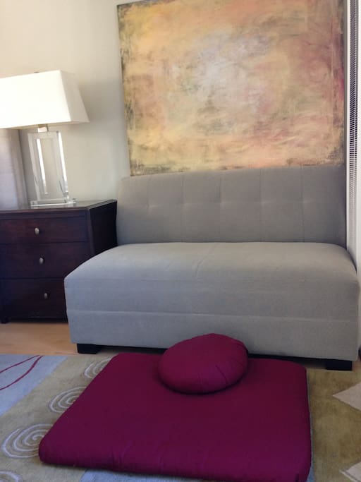 This is a sitting area or meditation space in the master