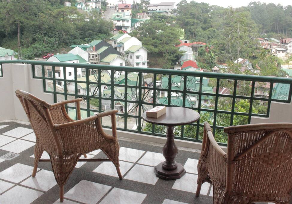 Balcony gives a good view of the neighborhood.