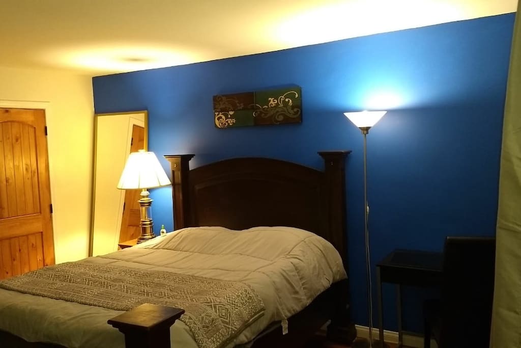 Queen size very comfortable Bed, Door beside walk in closet!