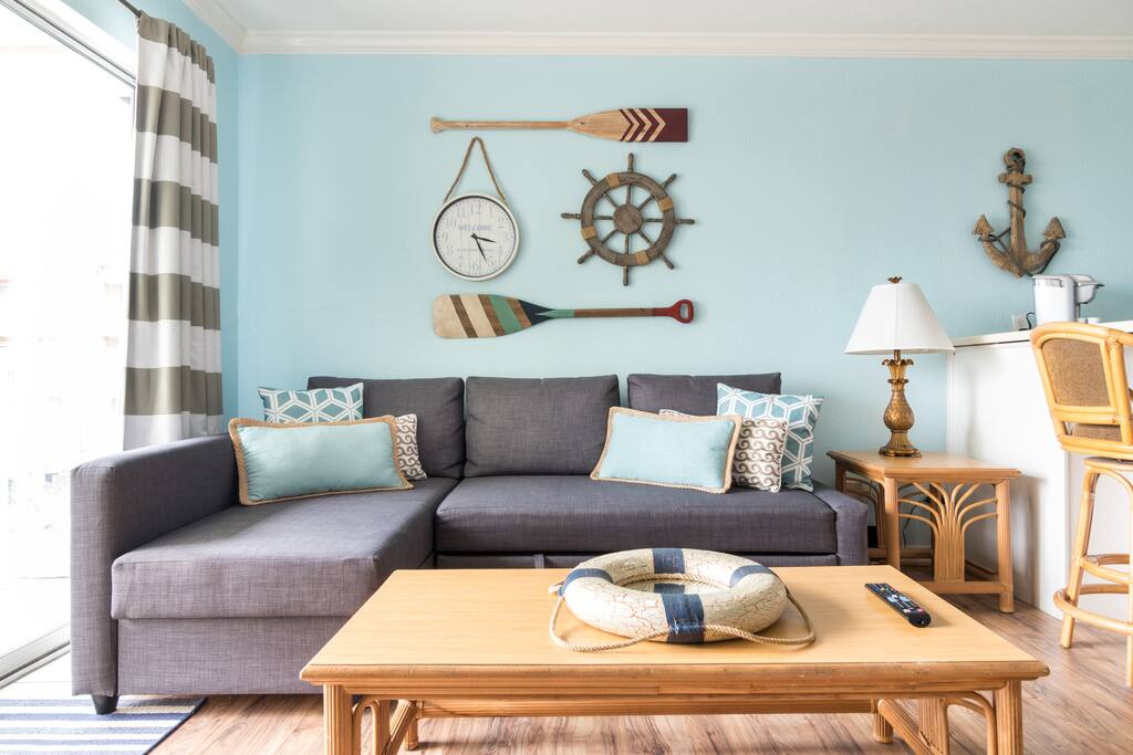 You'll enjoy tons of comfy pillows on our brand new sectional sofa. Pull it out to convert it into a full-size sleeper!