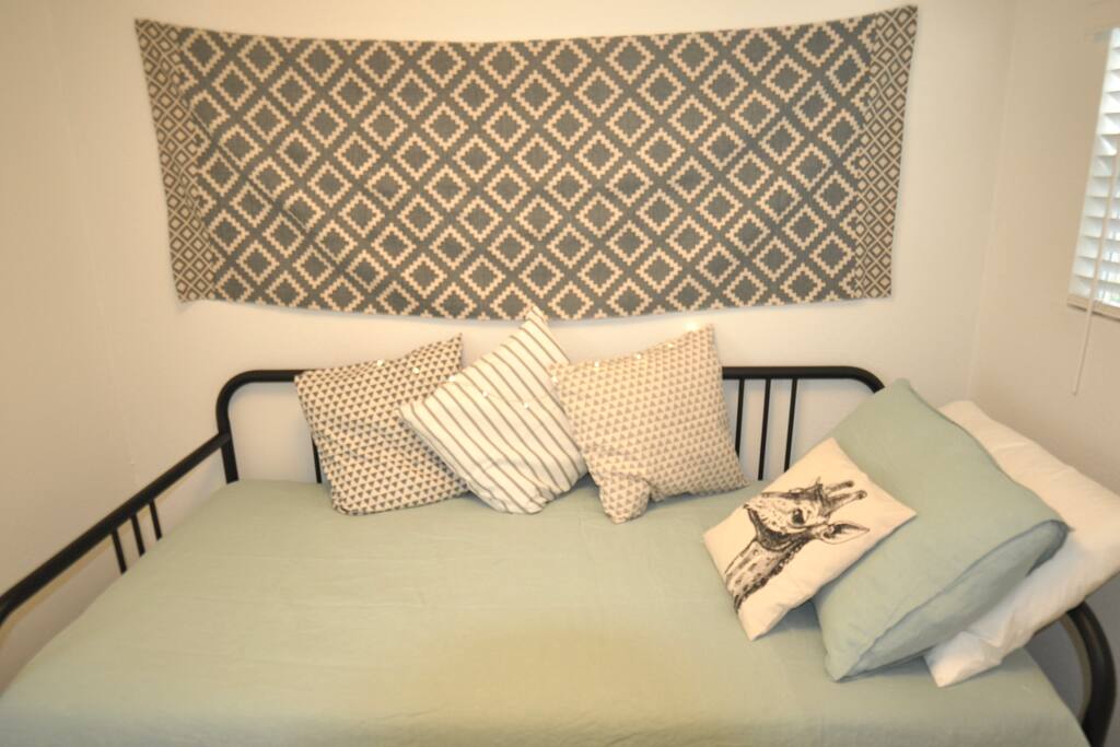 Second bedroom has a twin sized bed with 2 mattresses