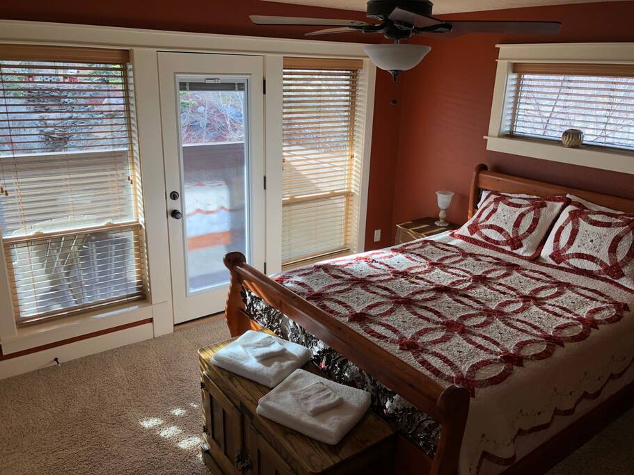 Main/master bedroom ("red" bedroom). Here you can see the door to get to the patio