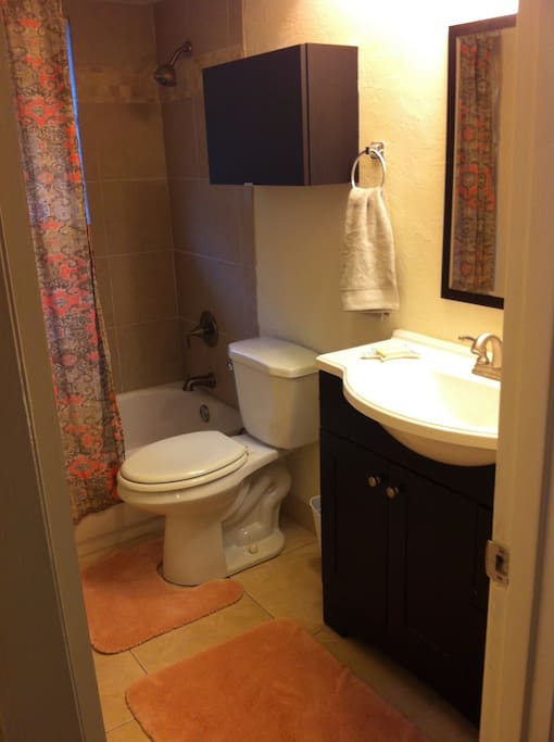 Bathroom with full tub and shower