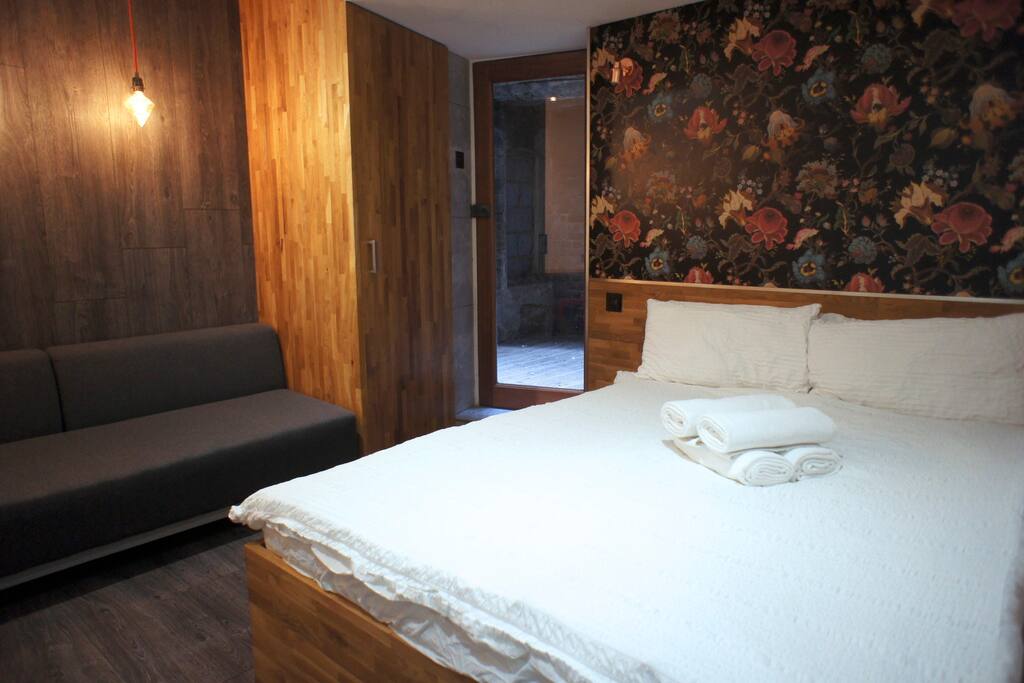 Here's your studio with double sofa-bed and patio