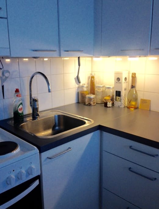 Kitchen also includes a microwave and a water boiler.