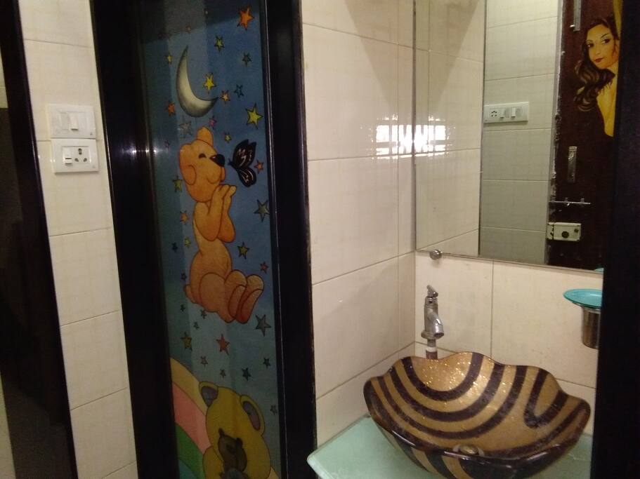 Western washroom and wash basin with mirror