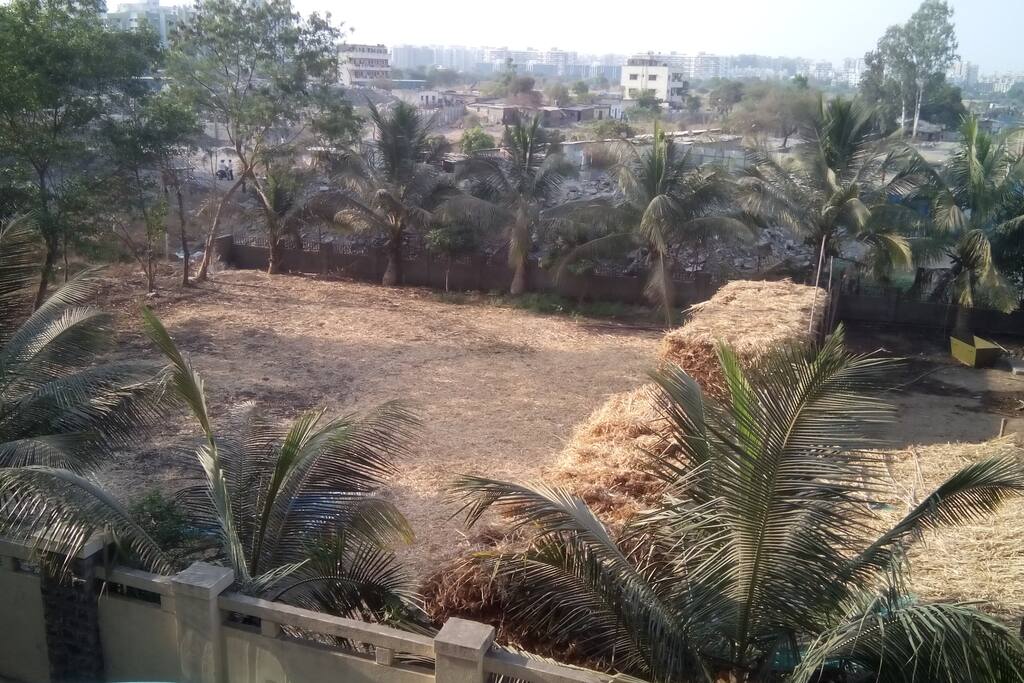 View of farm from balcony of sitting area