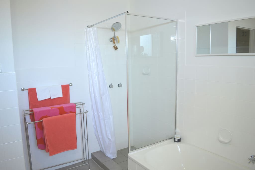Bathroom with shower and bath