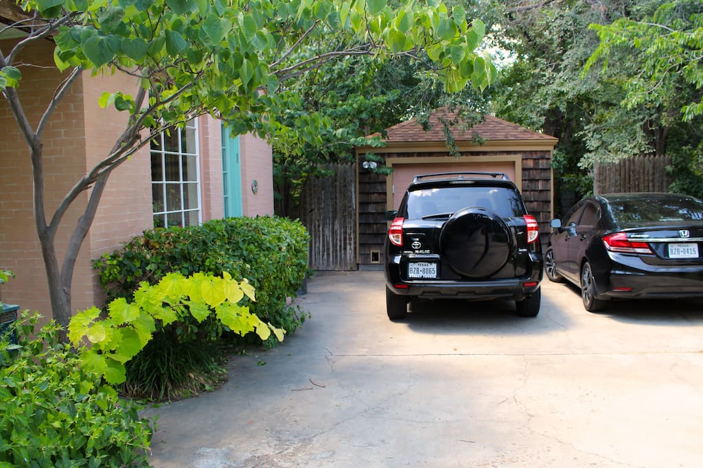 Guest access from driveway. The gate to the back yard is located to the left of our garage.