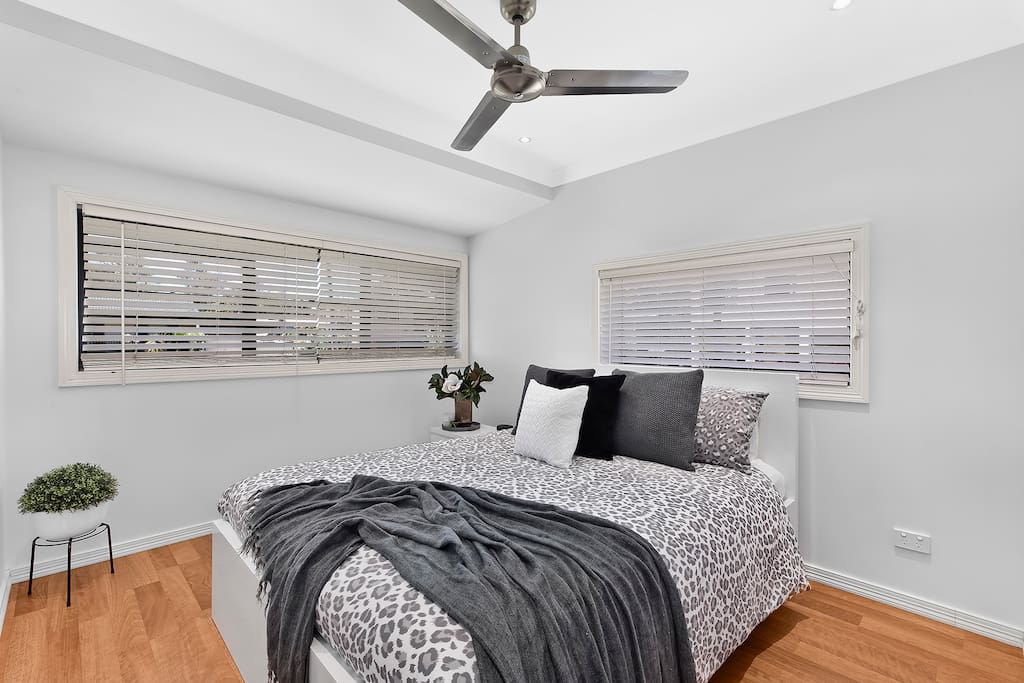 Master Bedroom - Queen bed with walk in robe and ceiling fan