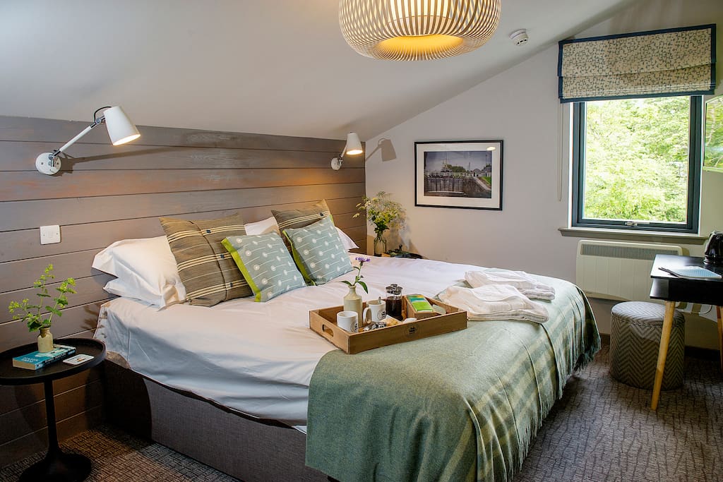 Neptune; sleeps 2 people with the option of a double bed or twin beds and offers an en-suite bathroom with bath and shower.