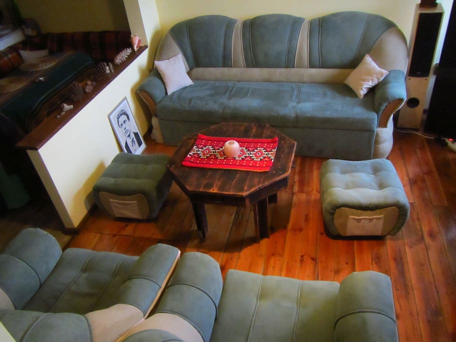 The big sofa can fit two persons.
That is the living room as well.
