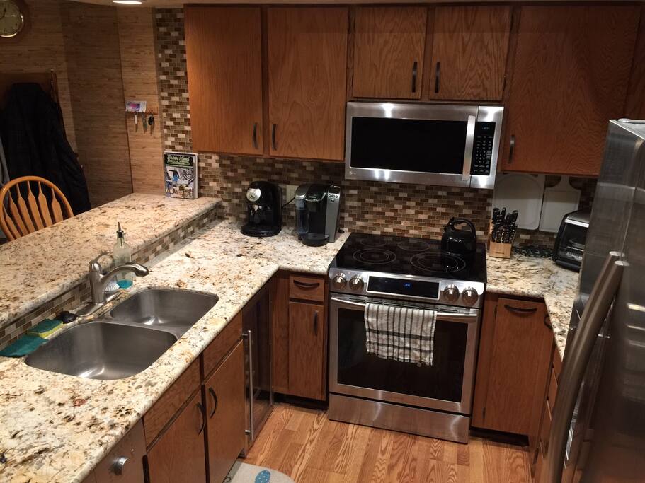 New 2016 upgraded kitchen with all your needs including a stocked wine fridge.