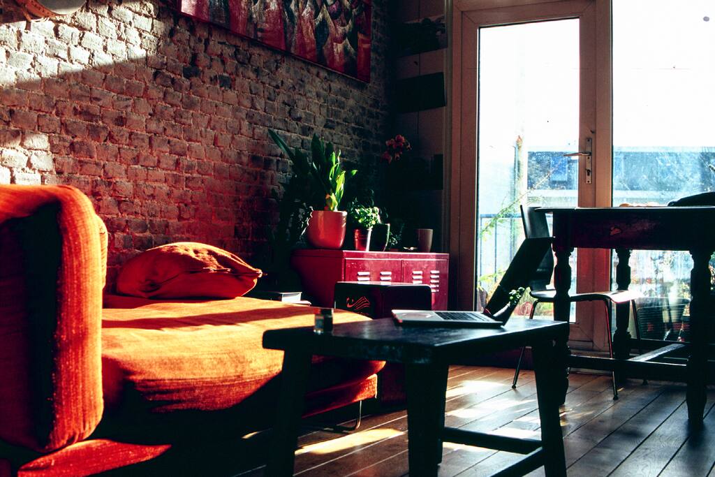 Big kitchen with table and sofa