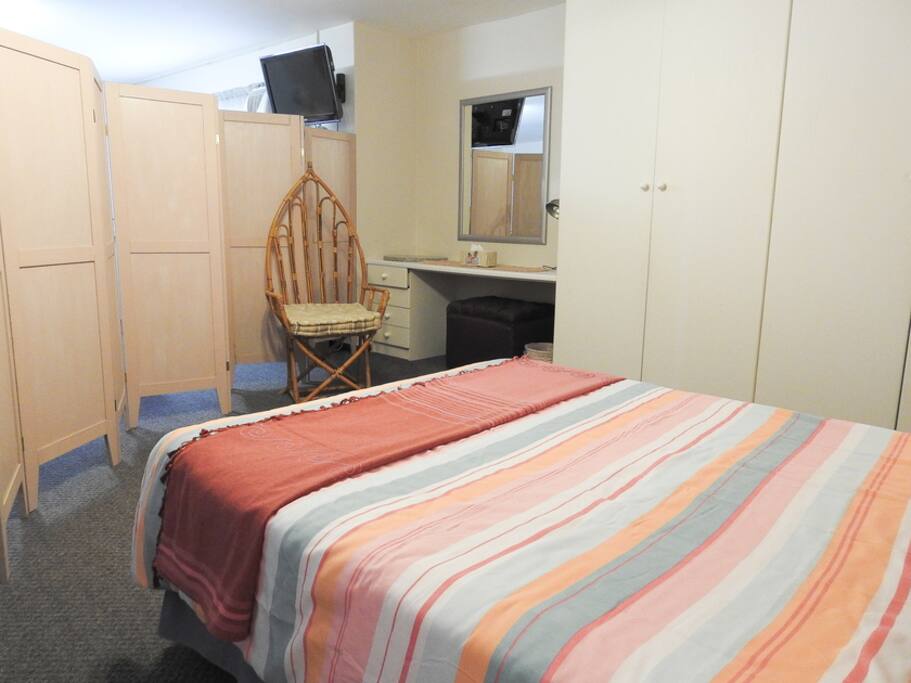 Studio apartment bedroom