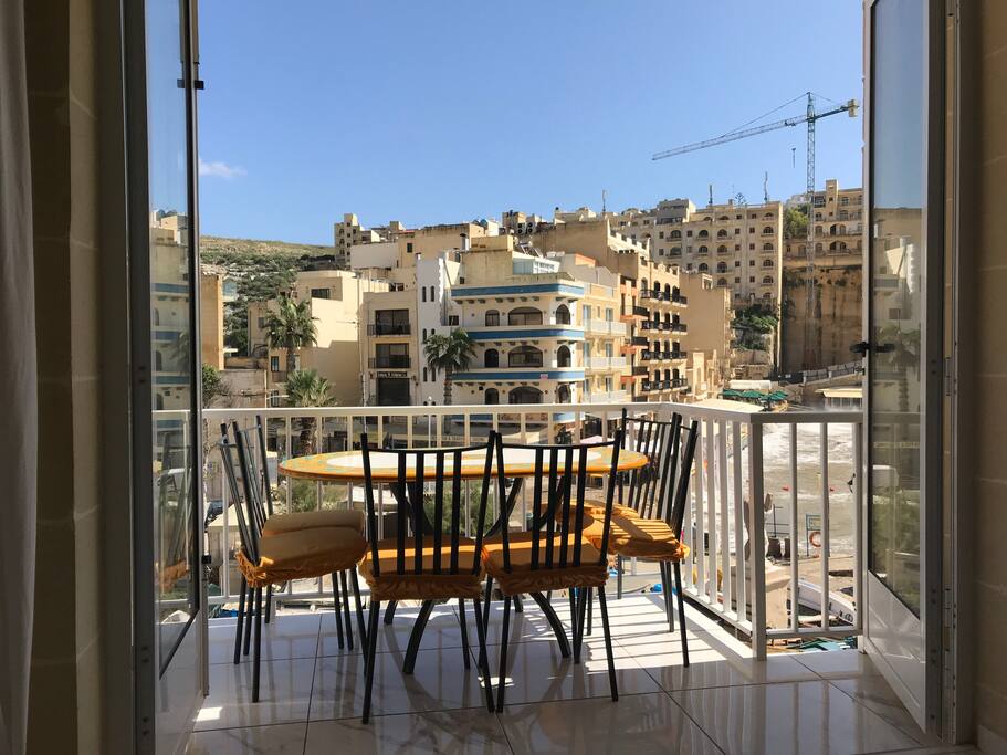 Balcony with table and chairs