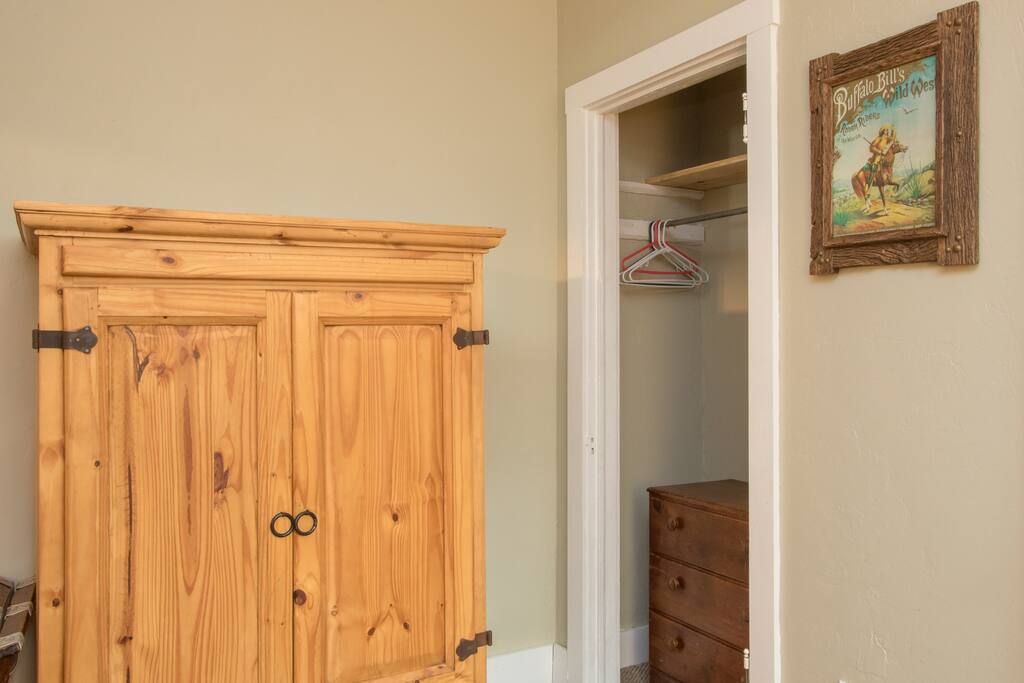Closet and armoire provides storage