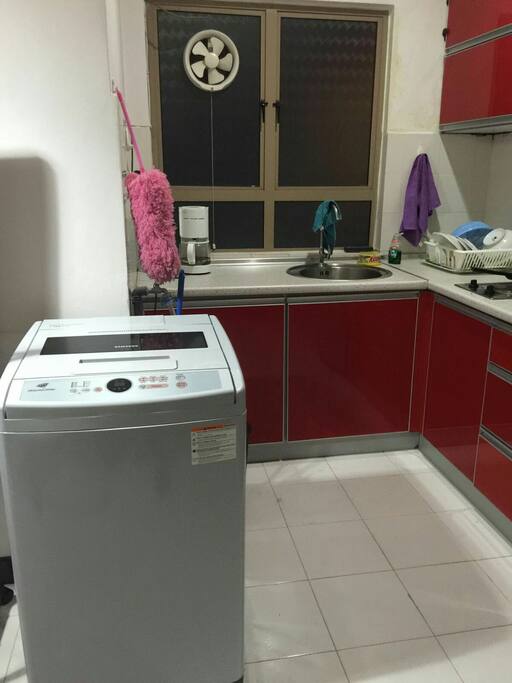 Washing machine and kitchen area