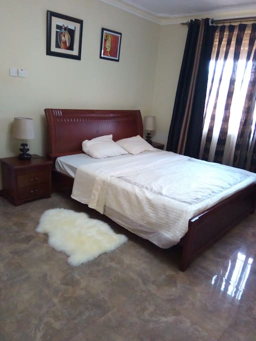 this is a master bedroom including bathroom.