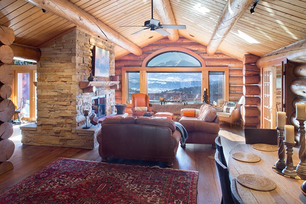 Great room with double-sided fireplace shared with the kitchen