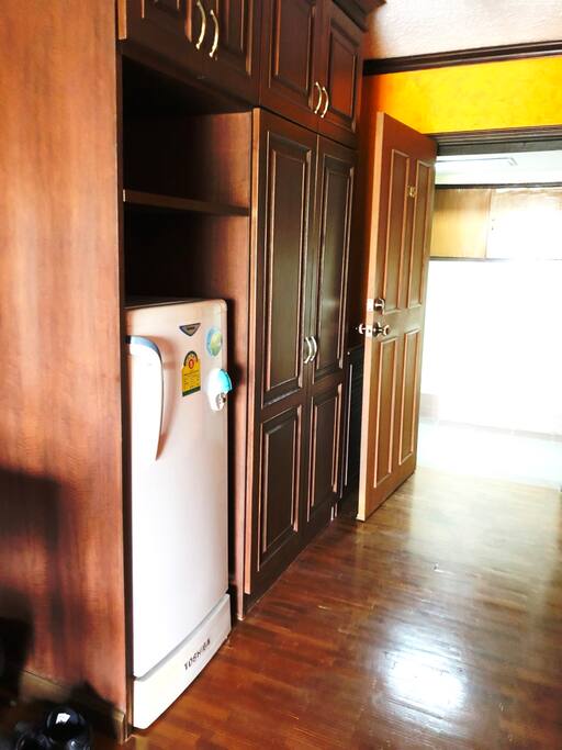 entrance to the room with refridgerator