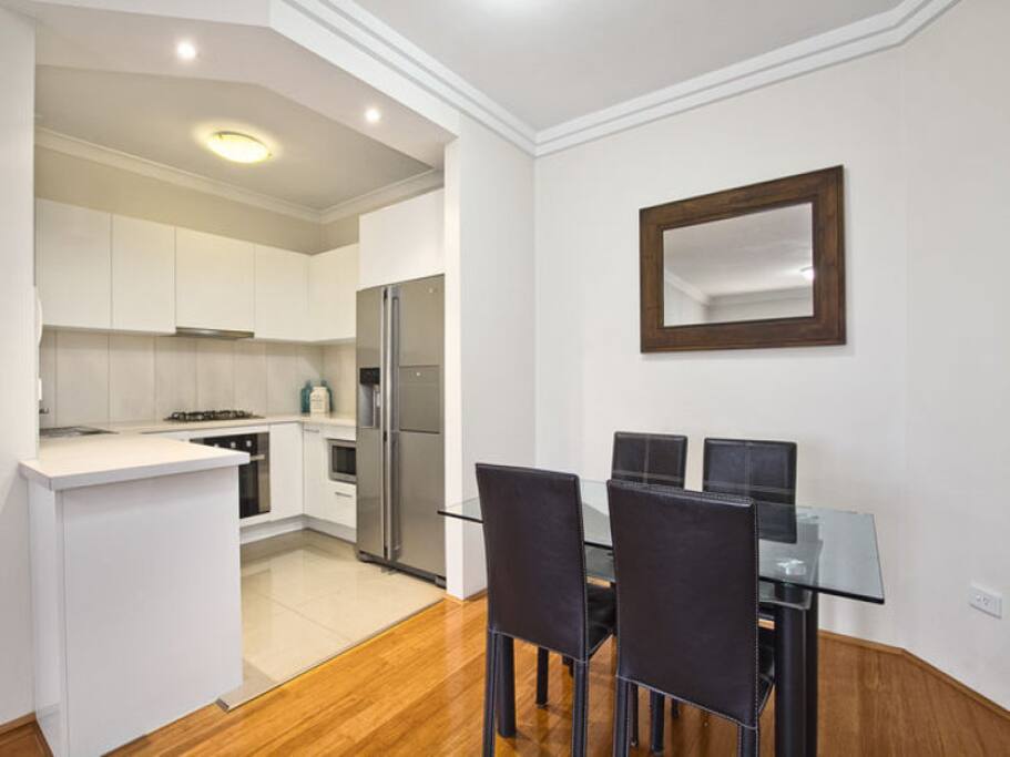 Beautifully renovated kitchen with gas stove and dishwasher