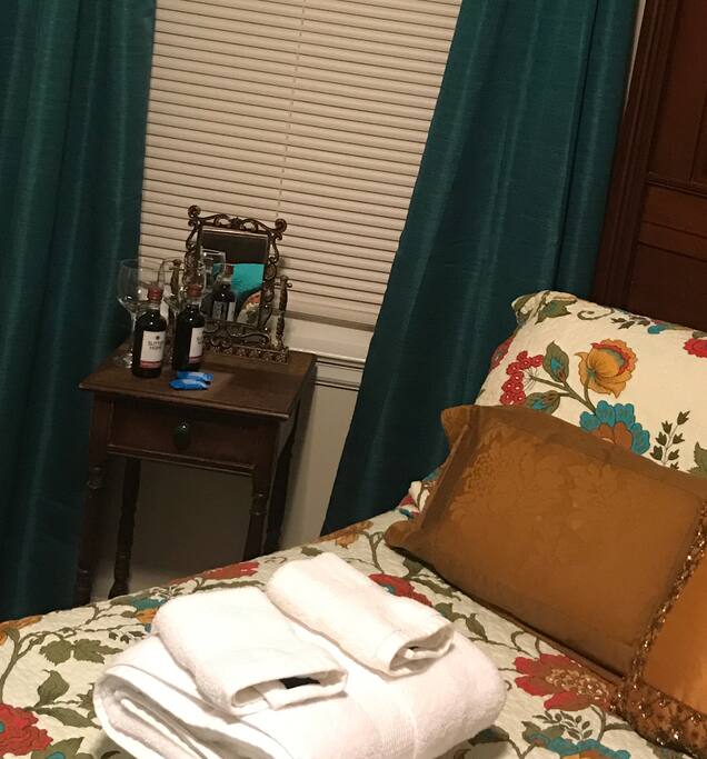 Fresh towels with a wine night cap