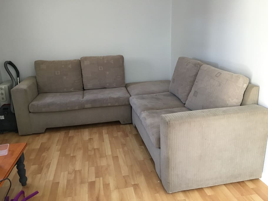 Lounge room with pull out double bed in couch.