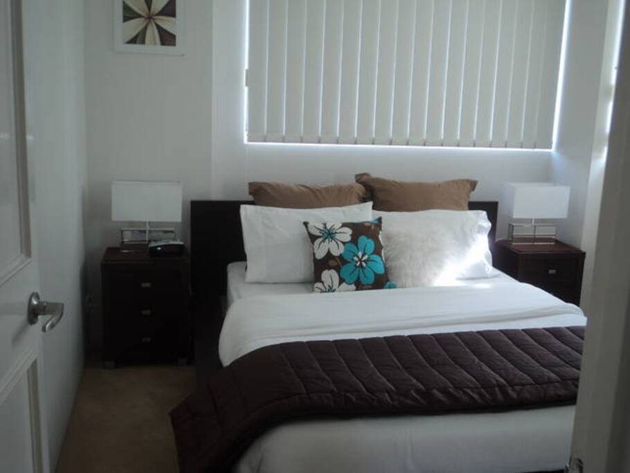 Queen Bed with Designer Linen