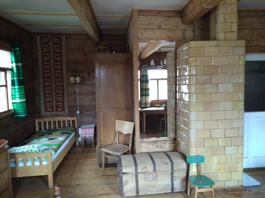 first bedroom, one double bed, one single, table