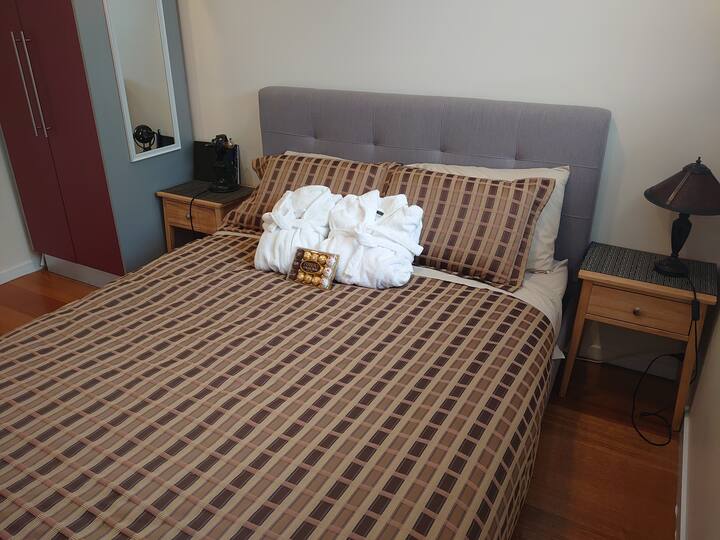 Luxury bedding, contour foam pillows, fluffy white bathrobes. Blackout blinds for restful sleep.