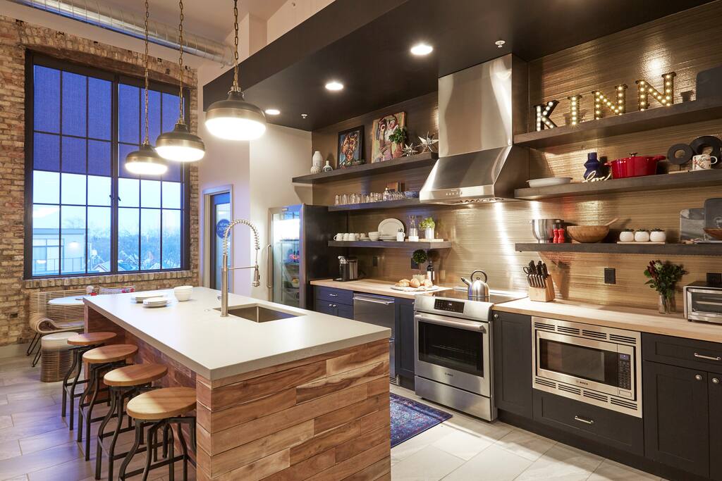 We wanted to mimic this sense of openness and community which we feel is important these days. To achieve this, we created a community lounge w/ a TV area, mini library, laundry and a complete, pro-series kitchen where one can share in the creature comforts of home. We feel we've created an environment where one can truly experience Milwaukee and, in particular, Bayview and do so on their own terms, a home away from home. Something they could call their own, even if for a few days.
