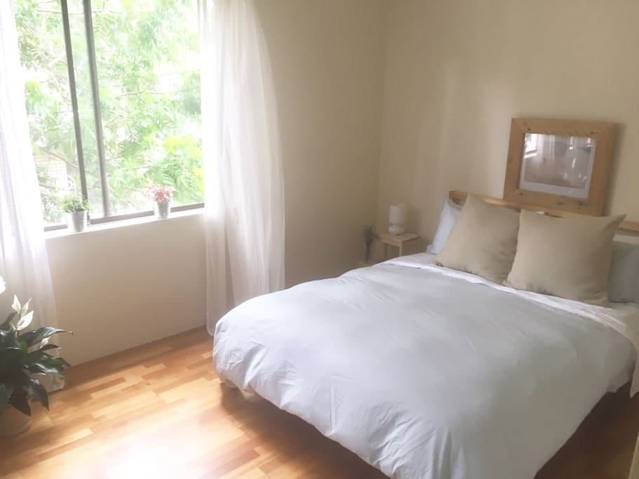 Sun-drenched master bedroom - light, airy with queen-size bed and huge BIR. Quality bed linen provided.
