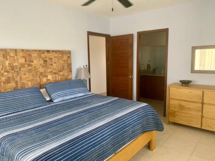 Master bedroom with en suite bathroom and more ocean and mountain views