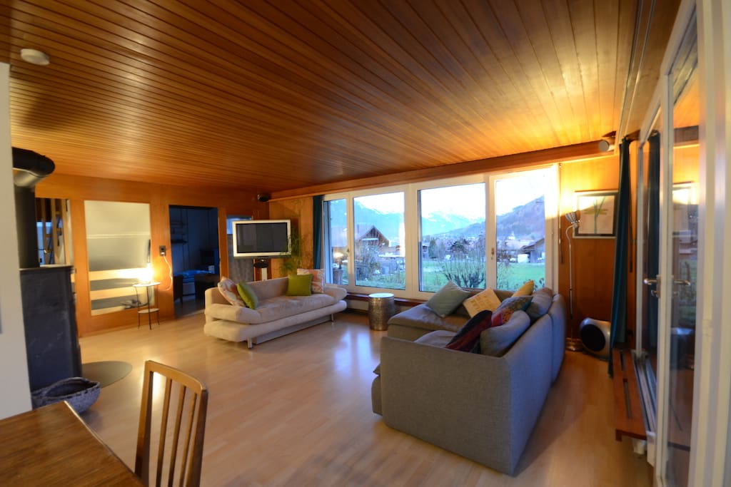 Large open plan dining and lounge area. Surrounding views are breathtaking