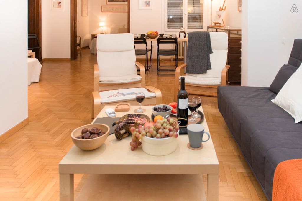Living room and bedroom in the background
