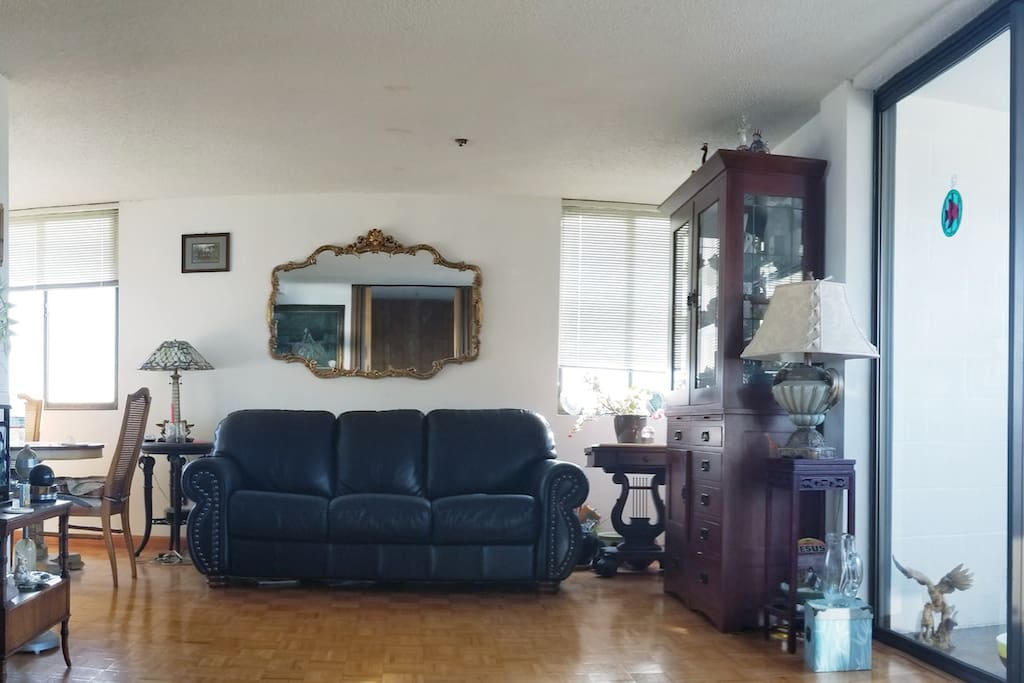 The condo has beautiful and open spacious living room with private indoor balcony. Spectacular night time view of hill sides.